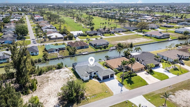 1815 SW 15th Pl, Cape Coral, FL 33991 - aerial view of residential area featuring a nearby body of water