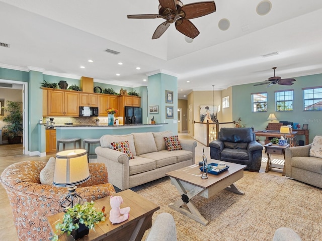 living area with visible vents, recessed lighting, and ceiling fan