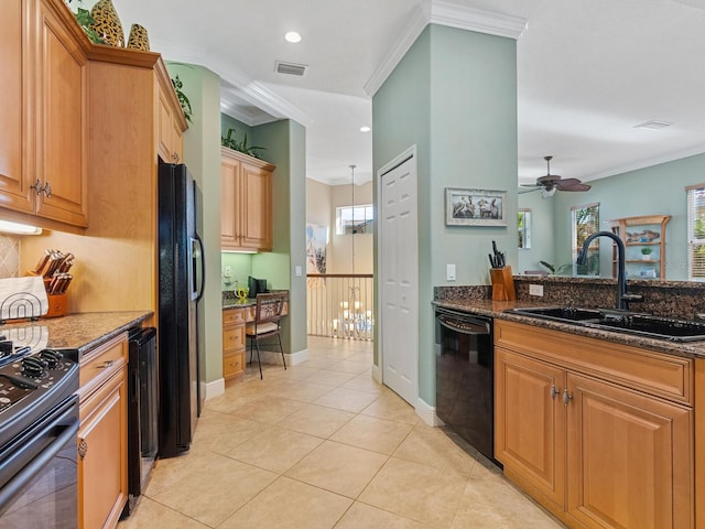 kitchen featuring a ceiling fan, a sink, plenty of natural light, and black appliances