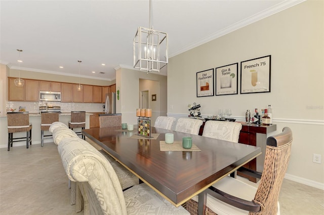 dining area with recessed lighting, light tile patterned floors, ornamental molding, baseboards, and a chandelier