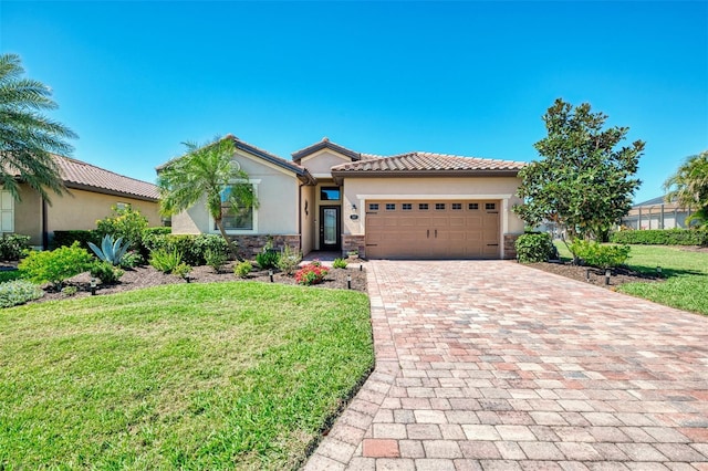 view of front of home with stone siding, decorative driveway, an attached garage, a front lawn, and stucco siding