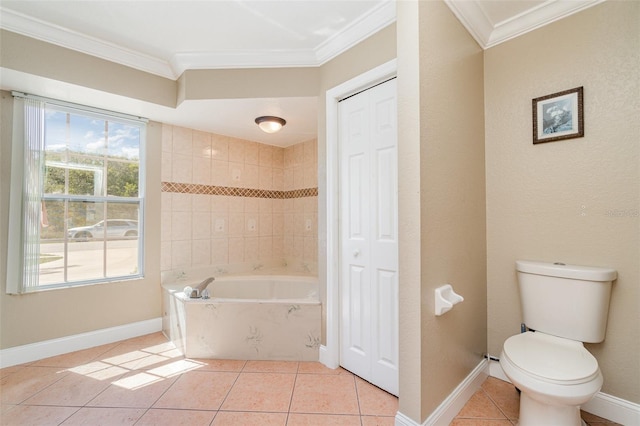 full bath featuring tile patterned flooring, a bathing tub, a closet, and ornamental molding
