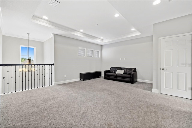 5954 Anise Dr, Sarasota, FL 34238 - living area with a tray ceiling, carpet, ornamental molding, recessed lighting, and a chandelier