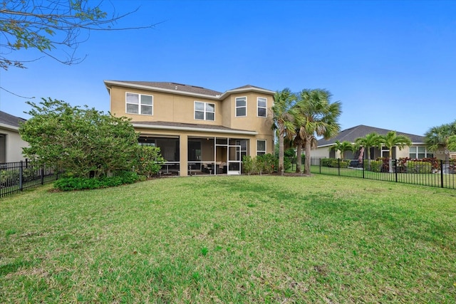 5954 Anise Dr, Sarasota, FL 34238 - rear view of property with stucco siding, a sunroom, and a fenced backyard
