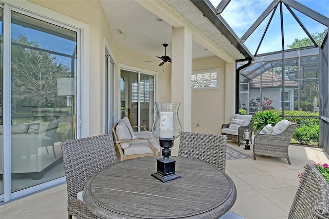 7137 Orchid Island Pl, Bradenton, FL 34202 - sunroom featuring outdoor dining space and a ceiling fan
