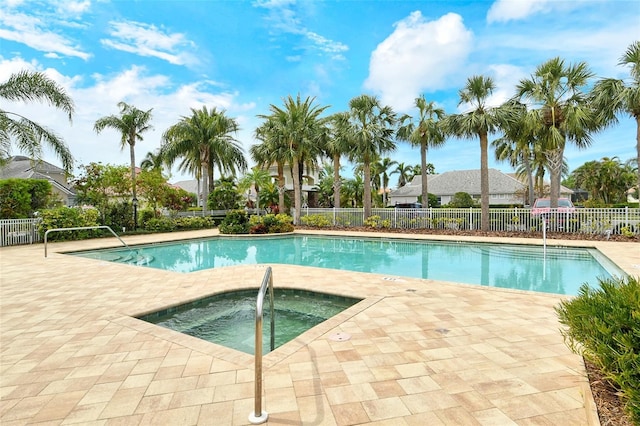 7137 Orchid Island Pl, Bradenton, FL 34202 - pool with a patio area, fence, and a hot tub