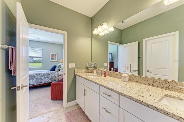5129 Marina Basin Ct, Bradenton, FL 34211 - bathroom with ensuite bath, double vanity, and tile patterned flooring