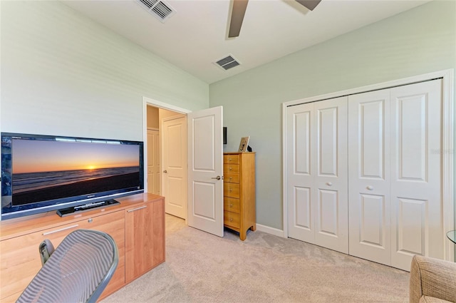5129 Marina Basin Ct, Bradenton, FL 34211 - bedroom with light colored carpet, a closet, and ceiling fan