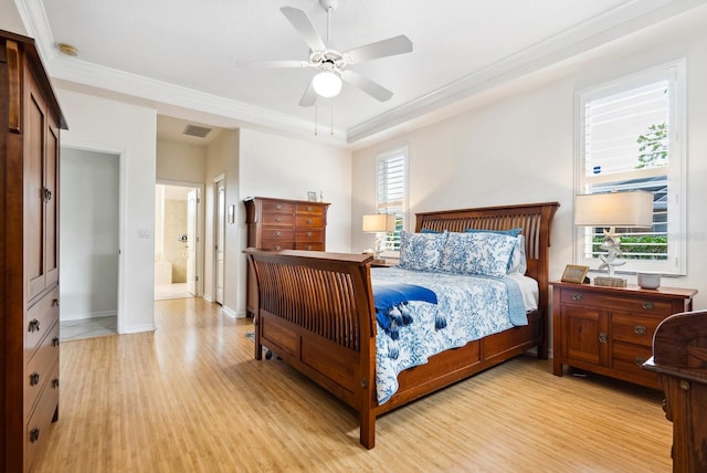 2439 Sonoma Dr W, Nokomis, FL 34275 - bedroom featuring light wood-style floors, crown molding, a ceiling fan, and baseboards