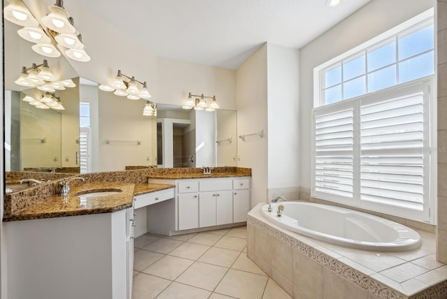 2439 Sonoma Dr W, Nokomis, FL 34275 - bathroom with a bath, vanity, and tile patterned flooring