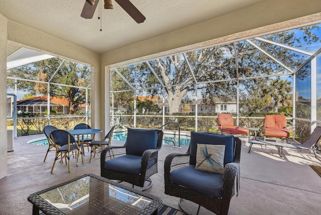 2439 Sonoma Dr W, Nokomis, FL 34275 - view of patio with glass enclosure, an outdoor pool, and a ceiling fan