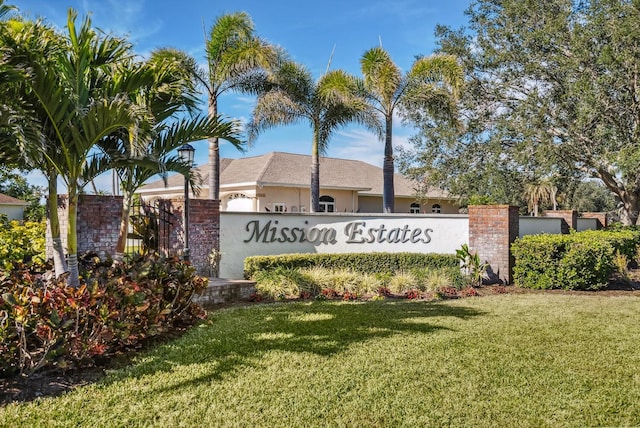 2439 Sonoma Dr W, Nokomis, FL 34275 - community sign with a lawn