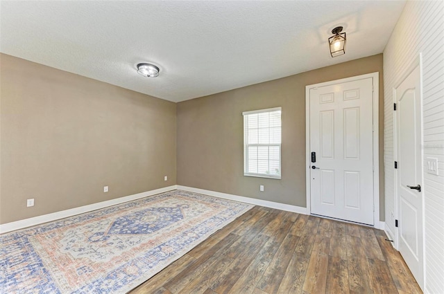 10614 Morning Marsh Ln, Parrish, FL 34219 - entryway featuring hardwood / wood-style floors and baseboards