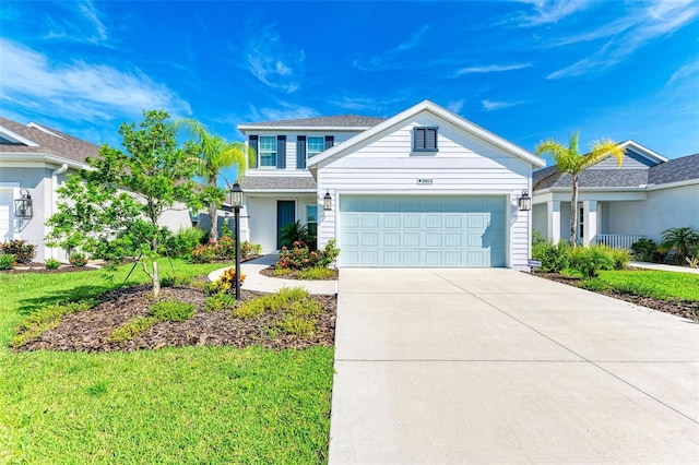 10614 Morning Marsh Ln, Parrish, FL 34219 - view of front facade with an attached garage, concrete driveway, and a front lawn