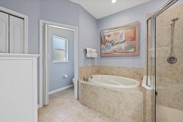 259 Golden Harbour Trl, Bradenton, FL 34212 - bathroom featuring tile patterned floors, baseboards, toilet, a stall shower, and a bath