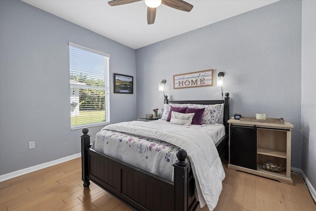 259 Golden Harbour Trl, Bradenton, FL 34212 - bedroom with a ceiling fan, baseboards, and light wood finished floors