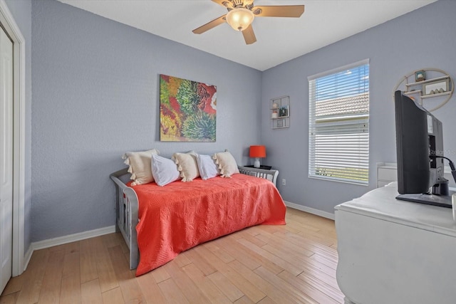 259 Golden Harbour Trl, Bradenton, FL 34212 - bedroom with a ceiling fan, baseboards, and light wood finished floors