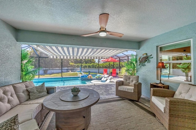 145 Baytree Dr, Rotonda West, FL 33947 - view of patio with an outdoor pool, a lanai, ceiling fan, and outdoor lounge area