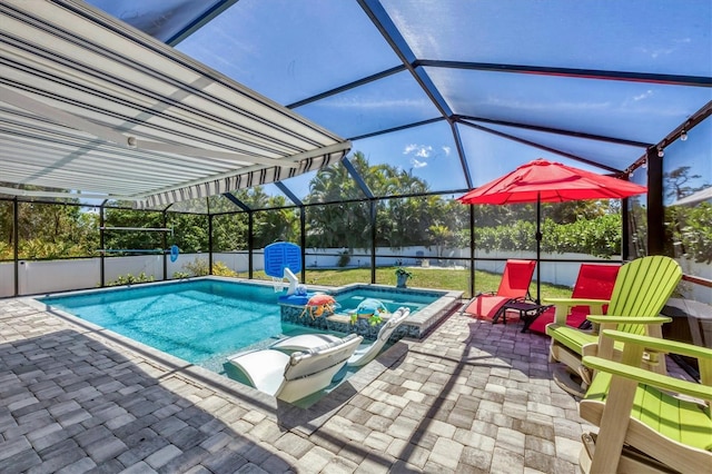 145 Baytree Dr, Rotonda West, FL 33947 - view of swimming pool with a hot tub, a patio area, and glass enclosure