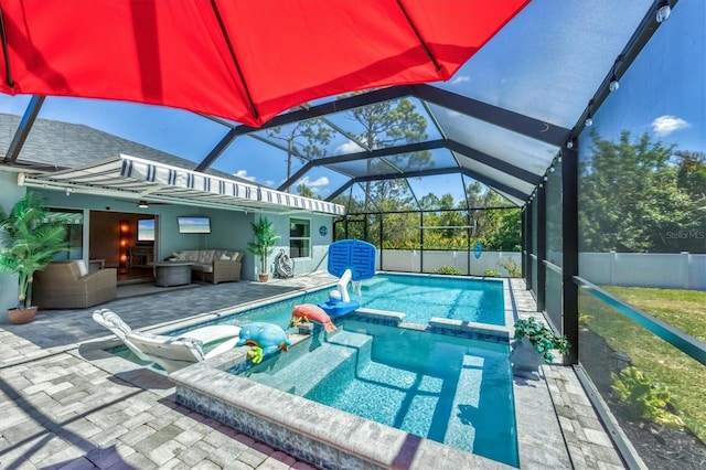 145 Baytree Dr, Rotonda West, FL 33947 - view of pool featuring an outdoor hangout area, a pool with connected hot tub, a patio, and glass enclosure
