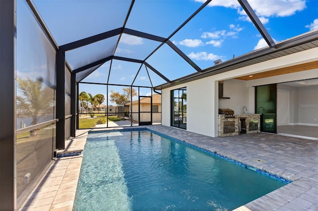 outdoor pool with area for grilling, a lanai, a grill, and a patio