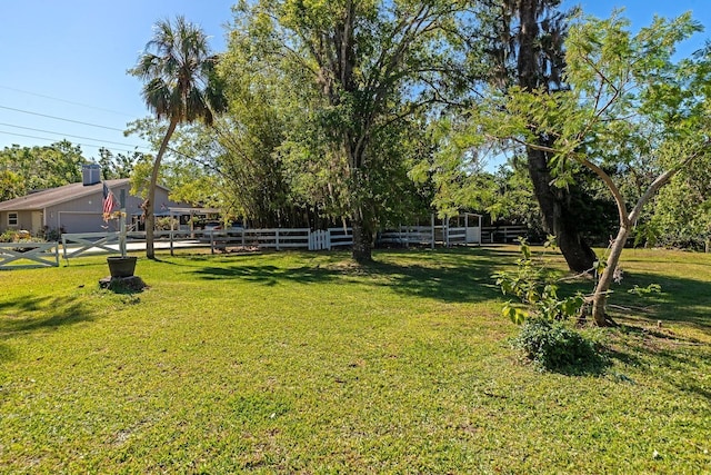 2070 59th St, Sarasota, FL 34243 - view of yard featuring an attached garage