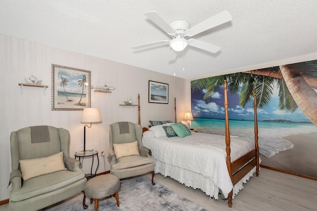2070 59th St, Sarasota, FL 34243 - bedroom with wood finished floors and ceiling fan