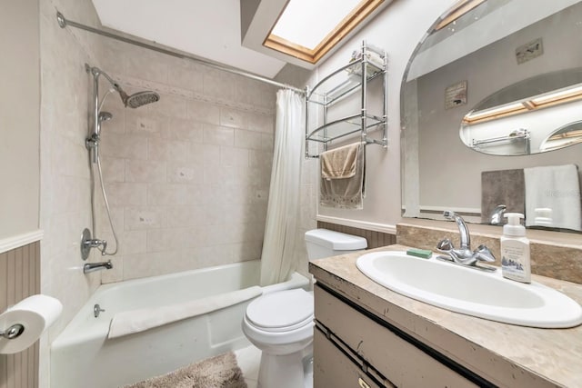 2070 59th St, Sarasota, FL 34243 - full bathroom featuring shower / bath combo, vanity, and wainscoting