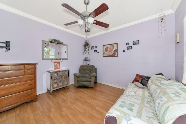 2070 59th St, Sarasota, FL 34243 - living area with crown molding, light wood-type flooring, and ceiling fan