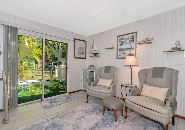 2070 59th St, Sarasota, FL 34243 - sitting room featuring wood finished floors and baseboards