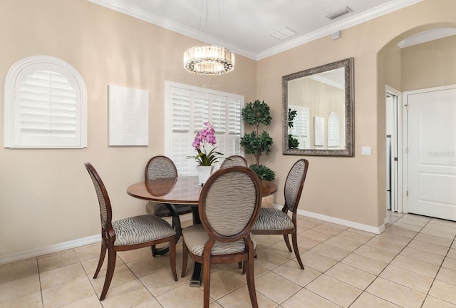 12211 Aster Ave, Bradenton, FL 34212 - dining area featuring a notable chandelier, baseboards, crown molding, and visible vents