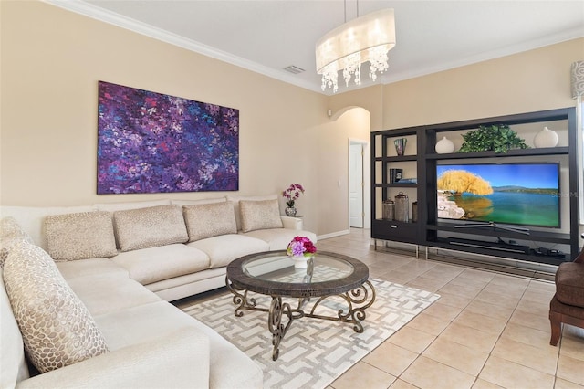 12211 Aster Ave, Bradenton, FL 34212 - tiled living room featuring a notable chandelier, visible vents, arched walkways, and ornamental molding