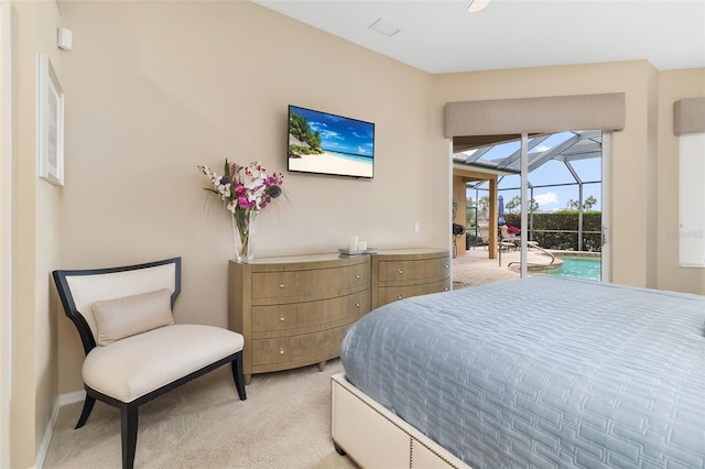 12211 Aster Ave, Bradenton, FL 34212 - bedroom featuring access to outside, light colored carpet, and a sunroom