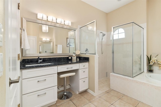 12211 Aster Ave, Bradenton, FL 34212 - bathroom with tiled shower, a garden tub, vanity, and tile patterned flooring