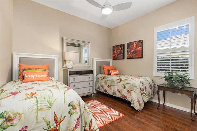 12211 Aster Ave, Bradenton, FL 34212 - bedroom with baseboards, wood finished floors, and a ceiling fan