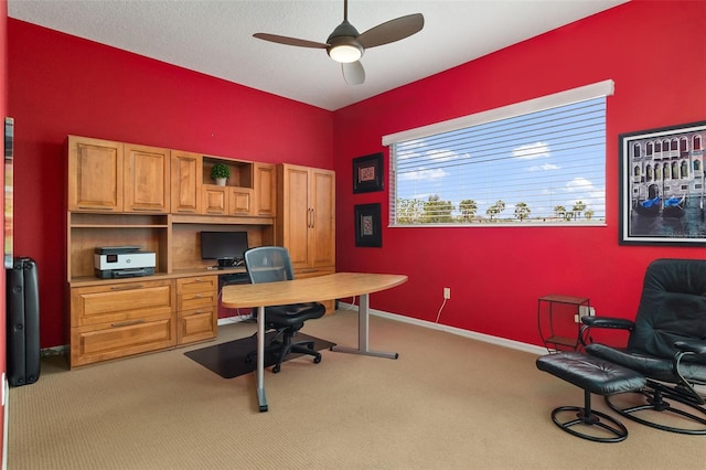 12211 Aster Ave, Bradenton, FL 34212 - carpeted home office featuring baseboards and a ceiling fan