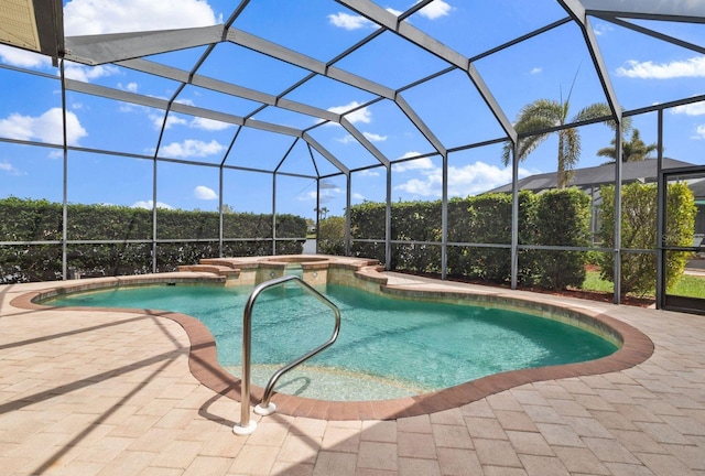 12211 Aster Ave, Bradenton, FL 34212 - view of pool with glass enclosure, a patio area, and a pool with connected hot tub