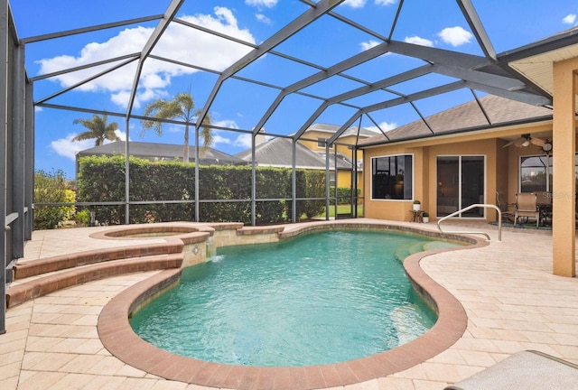 12211 Aster Ave, Bradenton, FL 34212 - outdoor pool with a patio, a ceiling fan, an in ground hot tub, and a lanai