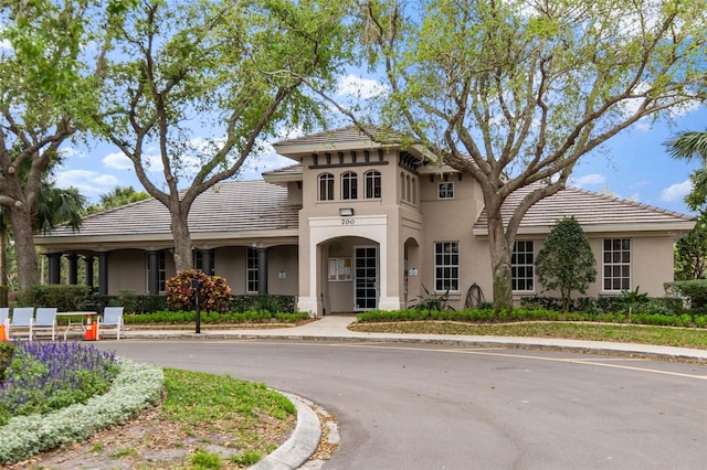 12211 Aster Ave, Bradenton, FL 34212 - view of front of home featuring stucco siding and a tiled roof