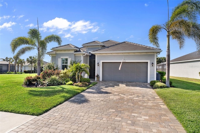 25325 Longmeadow Dr, Punta Gorda, FL 33955 - view of front facade with a garage, a tiled roof, decorative driveway, and a front lawn