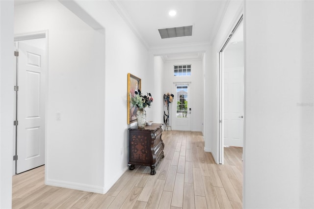 25325 Longmeadow Dr, Punta Gorda, FL 33955 - hallway with visible vents, baseboards, light wood-style floors, and ornamental molding