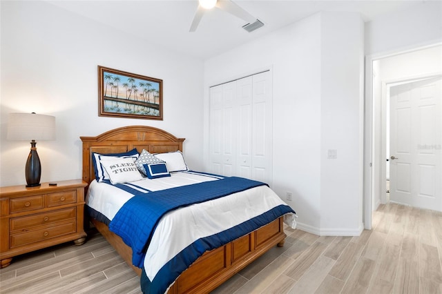 25325 Longmeadow Dr, Punta Gorda, FL 33955 - bedroom featuring visible vents, baseboards, a closet, and wood tiled floor