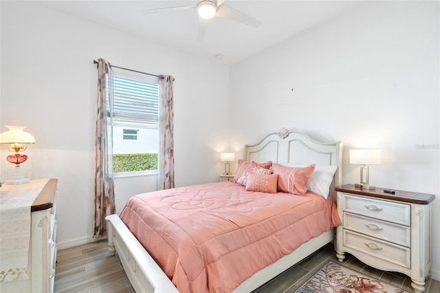 25325 Longmeadow Dr, Punta Gorda, FL 33955 - bedroom featuring ceiling fan, baseboards, and wood finished floors
