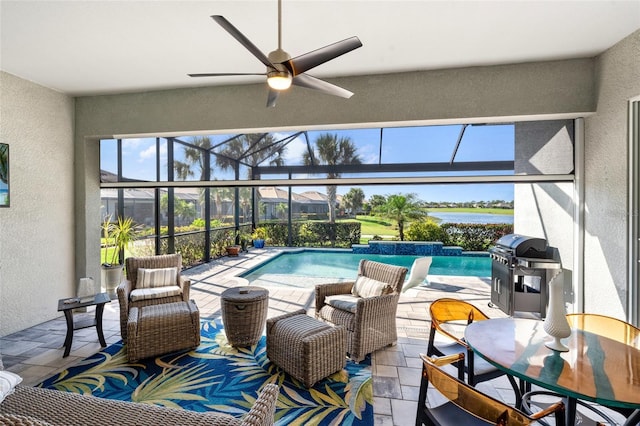 25325 Longmeadow Dr, Punta Gorda, FL 33955 - outdoor pool with a water view, a lanai, a patio area, a grill, and a ceiling fan