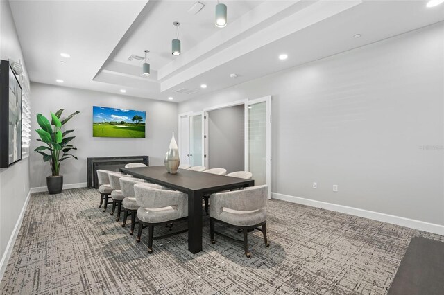 25325 Longmeadow Dr, Punta Gorda, FL 33955 - dining room featuring recessed lighting, baseboards, and a tray ceiling