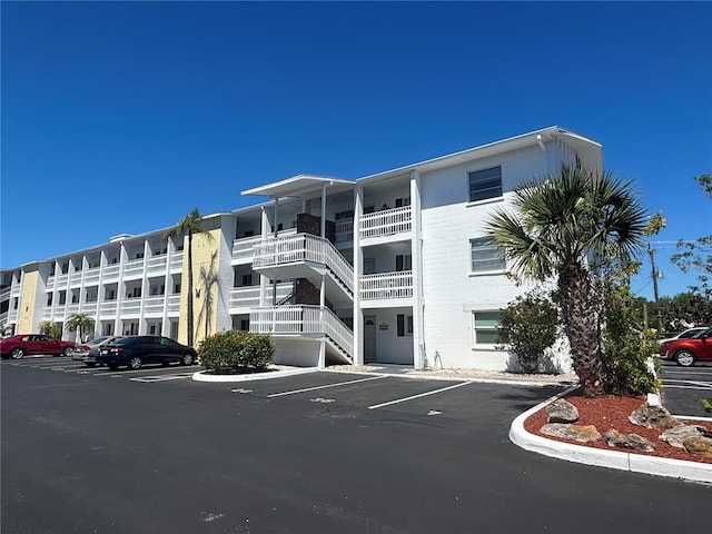 1633 Leisure Dr Unit M-37, Bradenton, FL 34207 - view of building exterior with uncovered parking