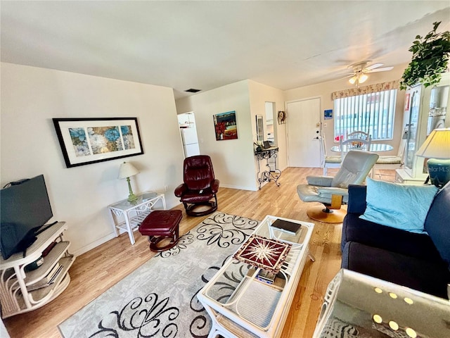 1633 Leisure Dr Unit M-37, Bradenton, FL 34207 - living area with wood finished floors and ceiling fan