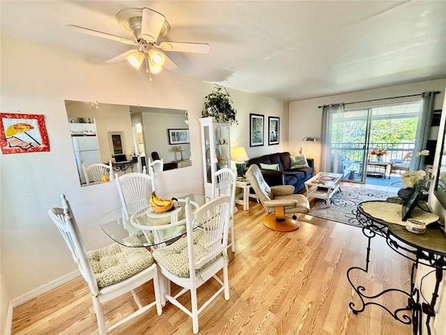 1633 Leisure Dr Unit M-37, Bradenton, FL 34207 - dining space featuring light wood-style flooring, a ceiling fan, and baseboards