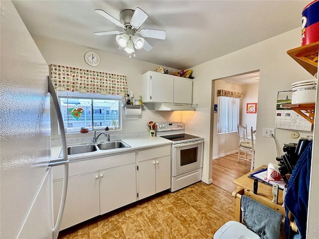1633 Leisure Dr Unit M-37, Bradenton, FL 34207 - kitchen featuring under cabinet range hood, light countertops, white appliances, a ceiling fan, and a sink