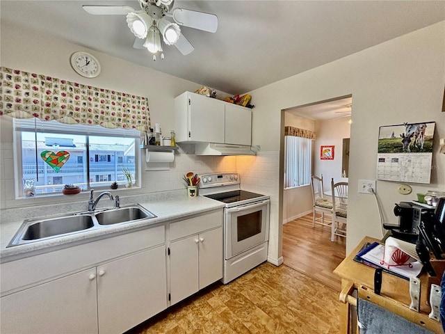1633 Leisure Dr Unit M-37, Bradenton, FL 34207 - kitchen with white electric range oven, a ceiling fan, a sink, light countertops, and under cabinet range hood